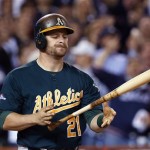 Oakland Athletics' Stephen Vogt reacts after striking out during the eighth inning of Game 4 of baseball's American League division series against the Detroit Tigers in Detroit, Tuesday, Oct. 8, 2013. (AP Photo/Paul Sancya)