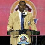 Former NFL football player Cris Carter speaks during the induction ceremony at the Pro Football Hall of Fame Saturday, Aug. 3, 2013, in Canton, Ohio. (AP Photo/Tony Dejak)
