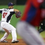United States' Gio Gonzalez delivers a pitch during a World Baseball Classic second-round game against Puerto Rico, Tuesday, March 12, 2013, in Miami. The United States won 7-1. (AP Photo /Mike Ehrmann, Pool)