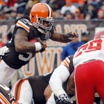 Cleveland Browns running back Trent Richardson dives over the goal line on a 1-yard touchdown run in the third quarter of an NFL football game against the Kansas City Chiefs, Sunday, Dec. 9, 2012, in Cleveland. (AP Photo/Tony Dejak)