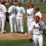St. Louis Cardinals starting pitcher Adam Wainwright leavs the game in the third inning of an exhibition spring training baseball game against the Houston Astros in Jupiter, Fla., Monday, Feb. 25, 2013. (AP Photo/Julio Cortez)