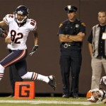  Chicago Bears wide receiver Brittan Golden (82) scores a touchdown on a 15-yard return of a blocked punt on Cleveland Browns' Reggie Hodges (2) in the third quarter of a preseason NFL football game, Thursday, Aug. 30, 2012, in Cleveland. The Bears won 28-20. (AP Photo/Ron Schwane)