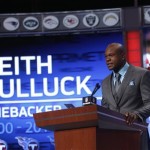 Former NFL football player Keith Bulluck announces the Tennessee Titans draft pick in the second round of the NFL Draft, Friday, April 26, 2013 at Radio City Music Hall in New York., Friday, April 26, 2013 at Radio City Music Hall in New York. The Titans selected Justin Hunter, a wide receiver from Tennessee, with the 34th overall pick in the draft. (AP Photo/Jason DeCrow)