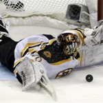 Boston Bruins goalie Tuukka Rask (40) stretches to make a save on a shot by Pittsburgh Penguins' Sidney Crosby (87), not shown, in the third period of Game 1 of the NHL hockey Stanley Cup Eastern Conference finals in Pittsburgh Saturday, June 1, 2013. The Bruins won 3-0. (AP Photo/Gene J. Puskar)