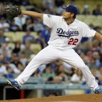 Los Angeles Dodgers starter Clayton Kershaw pitches to the Arizona Diamondbacks in the second inning of a baseball game in Los Angeles Monday, May 14, 2012. (AP Photo/Reed Saxon)