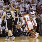San Antonio Spurs point guard Tony Parker (9) makes the final shot of the game against the Miami Heat during the second half of Game 1 of the NBA Finals basketball game, Thursday, June 6, 2013 in Miami. (AP Photo/Lynne Sladky)