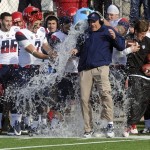  Arizona head coach Rich Rodriquez gets doused with water as the final seconds tick away in their 42-19 win over Boston College in the AdvoCare V100 Bowl NCAA college football game Tuesday, Jan 31, 2013, at Independence Stadium in Shreveport, La. (AP Photo/The Shreveport Times, Douglas Collier) MAGS OUT; MANDATORY CREDIT SHREVEPORTTIMES.COM; NO SALES
