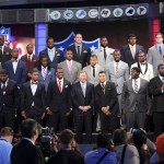 The top NFL football draft prospects pose for a group photo with Commissioner Roger Goodell, front row center, before the first round, Thursday, April 25, 2013, at Radio City Music Hall in New York. (AP Photo/Mary Altaffer)