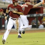 Arizona Diamondbacks' Miguel Montero scores on a base hit by Paul Goldschmidt against the Tampa Bay Rays during the first inning of a baseball game on Wednesday, Aug. 7, 2013, in Phoenix. (AP Photo/Matt York)