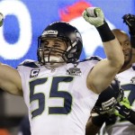 Seattle Seahawks' Heath Farwell reacts to an extra point against the Denver Broncos during the second half of the NFL Super Bowl XLVIII football game Sunday, Feb. 2, 2014, in East Rutherford, N.J. (AP Photo/Mark Humphrey)