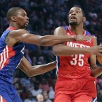East Team's Chris Bosh of the Miami Heat guards West Team's Kevin Durant of the Oklahoma City Thunder during the first half of the NBA All-Star basketball game Sunday, Feb. 17, 2013, in Houston. (AP Photo/Eric Gay)