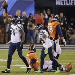 Seattle Seahawks' Kam Chancellor (31) celebrates after intercepting a pass intended for Denver Broncos tight end Julius Thomas (80) during the first half of the NFL Super Bowl XLVIII football game Sunday, Feb. 2, 2014, in East Rutherford, N.J. (AP Photo/Gregory Bull)