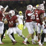  Stanford linebacker Shayne Skov, second from left, celebrates with teammates after recovering a fumble by Oregon running back De'Anthony Thomas during the first half of an NCAA college football game in Stanford, Calif., Thursday, Nov. 7, 2013. (AP Photo/Marcio Jose Sanchez)