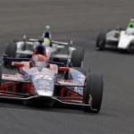 Marco Andretti drives through the first turn during the Indianapolis 500 auto race at Indianapolis Motor Speedway in Indianapolis, Sunday, May 26, 2013. (AP Photo/Tom Strattman)