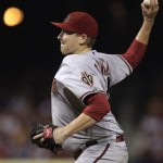 Arizona Diamondbacks' Trevor Cahill sets to deliver a pitch in the first inning of a baseball game against the St. Louis Cardinals, Thursday, Aug. 16, 2012, in St. Louis. (AP Photo/Tom Gannam)