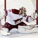  Phoenix Coyotes goalie Mike Smith makes a save against the Nashville Predators in the first period of an NHL hockey game Monday, Nov. 25, 2013, in Nashville, Tenn. (AP Photo/Mark Humphrey)