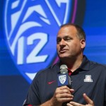 Arizona head coach Rich Rodriguez takes 
questions at the Pac-12 NCAA college football 
media day in Los Angeles, Tuesday, July 24, 
2012. (AP Photo/Damian Dovarganes)