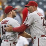Arizona Diamondbacks' Jason Kubel, left, is greeted by manager Kirk Gibson after a baseball game against the Pittsburgh Pirates, Thursday, Aug. 9, 2012, in Pittsburgh. Kubel hit two two-run home runs as the Diamondbacks defeated the Pirates 6-3. (AP Photo/Keith Srakocic)