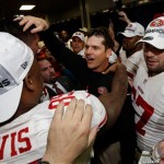 San Francisco 49ers head coach Jim Harbaugh celebrates with his team after the NFL football NFC Championship game against the Atlanta Falcons Sunday, Jan. 20, 2013, in Atlanta. The 49ers won 28-24 to advance to Super Bowl XLVII. (AP Photo/Dave Martin)