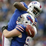 Buffalo Bills free safety Jairus Byrd celebrates an interception with teammate Kyle Williams during the second half of an NFL football game against the New York Jets on Sunday, Nov. 17, 2013, in Orchard Park, N.Y. (AP Photo/Gary Wiepert)