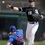 Chicago White Sox second baseman Gordon Beckham (15) fires over Chicago Cubs' Nate Schierholtz (19) to complete a double play on the Cubs' Scott Hairston in the second inning of an exhibition spring training baseball game Friday, March 15, 2013, in Glendale, Ariz. (AP Photo/Mark Duncan)