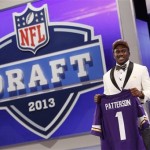 Wide receiver Cordarrelle Patterson from Tennessee holds up the team jersey after being selected 29th overall by the Minnesota Vikings in the first round of the NFL football draft, Thursday, April 25, 2013 at Radio City Music Hall in New York. (AP Photo/Jason DeCrow)