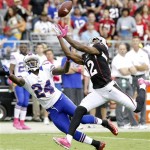 Arizona Cardinals wide receiver Andre Roberts (12) cannot make the catch as Buffalo Bills cornerback Terrence McGee (24) defends during the first half on an NFL football game on Sunday, Oct. 14, 2012, in Glendale, Ariz. (AP Photo/Rick Scuteri)
