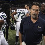 St. Louis Rams head coach Jeff Fisher leaves the field after an NFL football game against the Seattle Seahawks, Monday, Oct. 28, 2013, in St. Louis. The Seahawks won 14-9. (AP Photo/Tom Gannam)