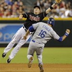 Arizona Diamondbacks' Aaron Hill can't make the catch as Los Angeles Dodgers' Andre Either steals second base during the fourth inning of a baseball game, Tuesday, July 9, 2013, in Phoenix. (AP Photo/Matt York)