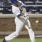 New York Mets' Anthony Recker hits a home run during the fifth inning of a baseball game against the Arizona Diamondbacks Tuesday, July 2, 2013, in New York. (AP Photo/Frank Franklin II)