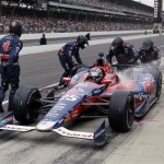 Marco Andretti makes a pit stop during the Indianapolis 500 auto race at the Indianapolis Motor Speedway in Indianapolis, Sunday, May 26, 2013. (AP Photo/Darron Cummings)