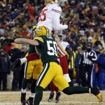  San Francisco 49ers tight end Vernon Davis (85) makes a touchdown reception against Green Bay Packers inside linebacker A.J. Hawk (50) during the second half of an NFL wild-card playoff football game, Sunday, Jan. 5, 2014, in Green Bay, Wis. (AP Photo/Jeffrey Phelps)