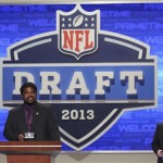 Baltimore Ravens Hall of Famer Jonathan Ogden is joined by NFL commissioner Roger Goodell as he announces a draft pick during the second round of the NFL Draft, Friday, April 26, 2013 at Radio City Music Hall in New York. (AP Photo/Mary Altaffer)