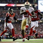 San Francisco 49ers' Frank Gore (21) breaks away for a nine-yard touchdown run during the second half of the NFL football NFC Championship game against the San Francisco 49ers Sunday, Jan. 20, 2013, in Atlanta. (AP Photo/David Goldman)