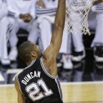 San Antonio Spurs' Tim Duncan (21) dunks the ball against the Miami Heat during the first half in Game 7 of the NBA basketball championships, Thursday, June 20, 2013, in Miami. (AP Photo/Wilfredo Lee)
