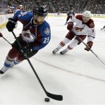  Colorado Avalanche center Maxime Talbot (25) skates against Phoenix Coyotes defenseman Keith Yandle (3) during the third period of an NHL hockey game on Friday, Feb. 28, 2014, in Denver. (AP Photo/Jack Dempsey)