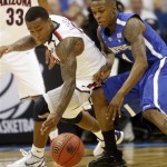 Arizona guard Lamont Jones, left, and Memphis guard Joe Jackson go after a loose ball in the first half of a West Regional NCAA tournament second-round college basketball game, Friday, March 18, 2011 in Tulsa, Okla. (AP Photo)