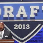 Former Arizona Cardinals fullback Larry Centers announces an NFL football draft pick during the second round on Friday, April 26, 2013, at Radio City Music Hall in New York. (AP Photo/Mary Altaffer)