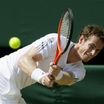 Andy Murray of Britain sends a backhand return to opponent Novak Djokovic of Serbia during the Men's singles final match at the All England Lawn Tennis Championships in Wimbledon, London, Sunday, July 7, 2013. (AP Foto/Alastair Grant)
