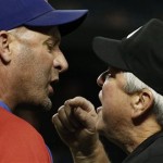 Chicago Cubs manager Dale Sveum, left, argues with umpire Dana DeMuth after DeMuth tossed Sveum out of the game after the third inning of a baseball game against the Arizona Diamondbacks on Tuesday, July 23, 2013, in Phoenix. (AP Photo/Ross D. Franklin)