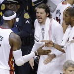 The Miami Heat's LeBron James (6) speaks with players in the closing moments of the second half in Game 7 of the NBA basketball championship against the San Antonio Spurs, Thursday, June 20, 2013, in Miami. The Miami Heat won 95-88. (AP Photo/Wilfredo Lee)