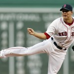 Boston Red Sox's Jake Peavy pitches in the second inning of a baseball game against the Arizona Diamondbacks in Boston, Saturday, Aug. 3, 2013. (AP Photo/Michael Dwyer)
