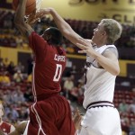 Arizona State forward Jonathan Gilling, right, slaps the ball out of the 
hands of Washington State guard Marcus Capers, left, in the first half 
on an NCAA college basketball game on Saturday, Jan. 28, 2012, in 
Tempe, Ariz. (AP Photo/Paul Connors)