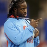 Alabama running back Eddie Lacy watches the action during the NFL football scouting combine in Indianapolis, Sunday, Feb. 24, 2013. Lacy did not participate in the drills. (AP Photo/Dave Martin)