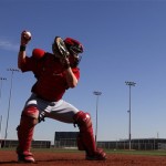 Cincinnati Reds catcher Ryan Hanigan works out during spring training baseball in Goodyear, Ariz., Saturday, Feb. 16, 2013. (AP Photo/Paul Sancya)
