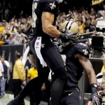 New Orleans Saints wide receiver Lance Moore (16) leaps on wide receiver Marques Colston after Colston's touchdown reception during the first half of an NFL football game against the Philadelphia Eagles at Mercedes-Benz Superdome in New Orleans, Monday, Nov. 5, 2012. (AP Photo/Bill Haber)