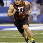 Texas A&M offensive lineman Luke Joeckel runs a drill during the NFL football scouting combine in Indianapolis, Saturday, Feb. 23, 2013. (AP Photo/Dave Martin)

