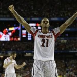 Louisville forward Chane Behanan (21) reacts after defeating Michigan 82-76 in the NCAA Final Four tournament college basketball championship game, Monday, April 8, 2013, in Atlanta. (AP Photo/David J. Phillip)