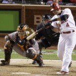 St. Louis Cardinals' Yadier Molina hits a run-scoring double during the seventh inning of Game 4 of baseball's National League championship series against the San Francisco Giants Thursday, Oct. 18, 2012, in St. Louis. (AP Photo/Mark Humphrey)
