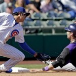  Colorado Rockies' Ben Paulsen (66) is safe at third with Chicago Cubs' Christian Villanueva covering during the fifth inning of an exhibition spring training baseball game, Tuesday, Feb. 26, 2013, in Phoenix. Paulsen advanced from first on a single by Ramon Hernandez. (AP Photo/Morry Gash)